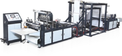 Non Woven D Cut Bag Making Machine - 12KW Power Consumption, 100-120 Pcs/Min Production Capacity | Automatic, Electric Drive, 380/220 Voltage, White and Black Color